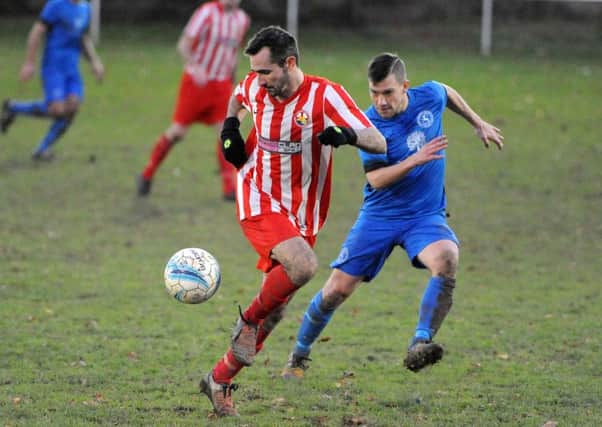 Action from Midhurst's draw with Steyning / Picture by Steve Robards
