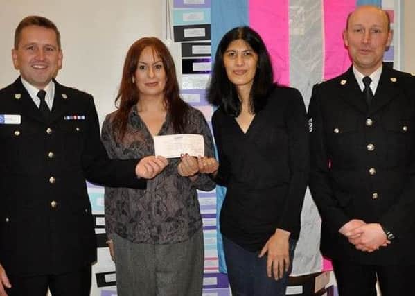 Sussex Police have donated Â£500 to help fund the Trans Alliance's Trans Day of Remembrance event.