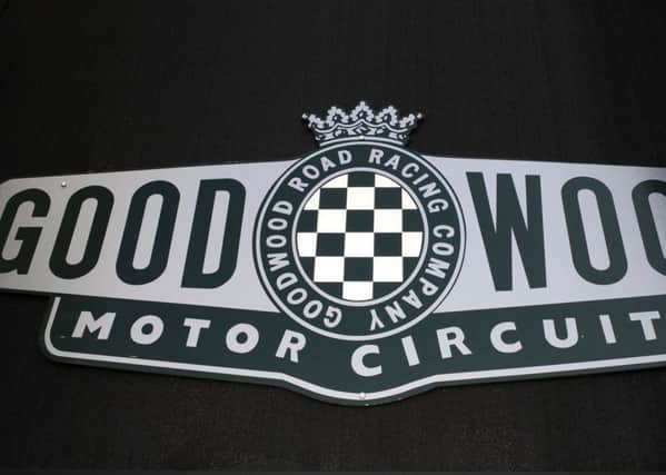 GOODWOOD 72MM  CHICHESTER OBSERVER (BB) MRW 29/3/2014

The 72nd Members Meeting at Goodwood Motor Circuit and the sun shone all day ! 

The Good logo for the Motor Circuit 

Picture: Malcolm Wells (14810-6720) PPP-140331-074609003