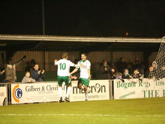 Harvey Whyte celebrates his goal with Ollie Pearce / Picture by Tim Hale