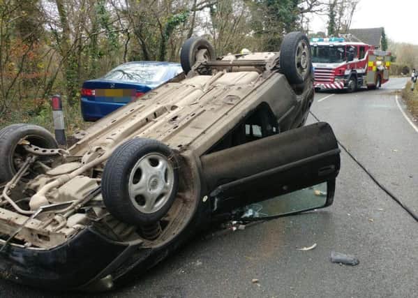 A car has overturned in Titnore Lane, Worthing. Picture: Eddie Mitchell