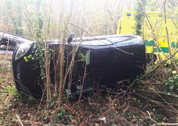 Two cars crashed into the ditch on the busy road. Picture: Eddie Mitchell