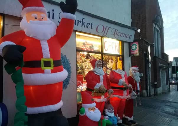 The 'most decorated shop in Hastings' with the headless Santa