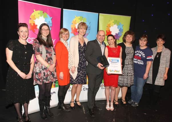 DM1617882a.jpg Crawley Community Awards 2016. Autism Support receives the Support Group award from Katie Bennett. Photo by Derek Martin. SUS-160320-005148008