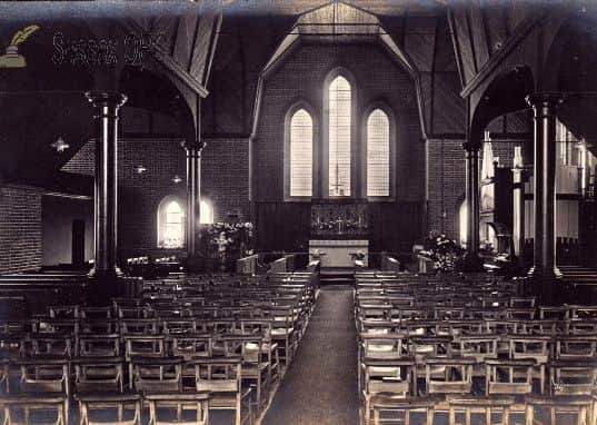 St Andrew's Church interior on a postcard. Photo courtesy of Carole Woodland SUS-161212-130608001