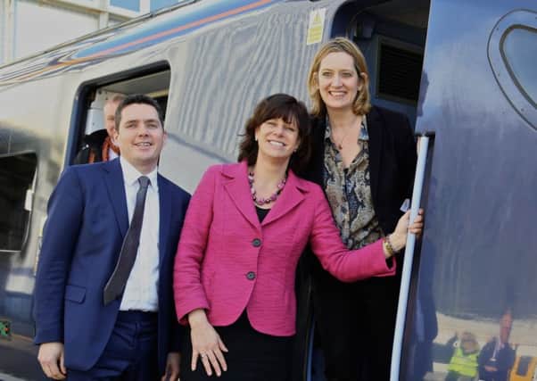 Huw Merriman MP, former transport minister Claire Perry and Amber Rudd MP SUS-150511-075751001