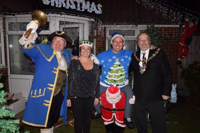 Debbie and Mark Scott, renowned for their impressive Christmas lights at their home in Windermere Crescent, were joined by Worthing mayor Sean McDonald and town crier Bob Smytherman for their switch on event