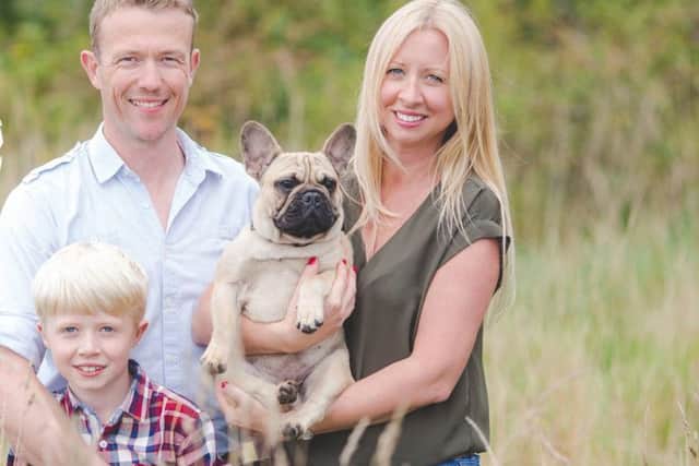 Louise and Richard Whittington with their son Caspar, nine, and their french bulldog Rupert. Picture: Cherry Red Photography