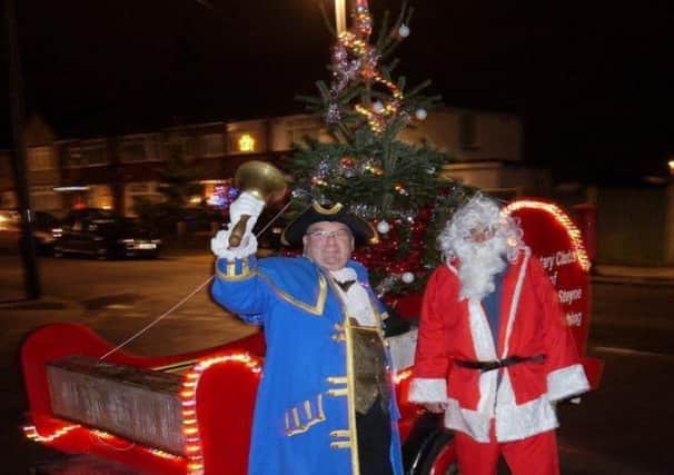 Town crier Bob Smytherman with Father Christmas