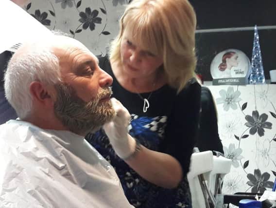 Council leader David Tutt had his beard dyed for charity