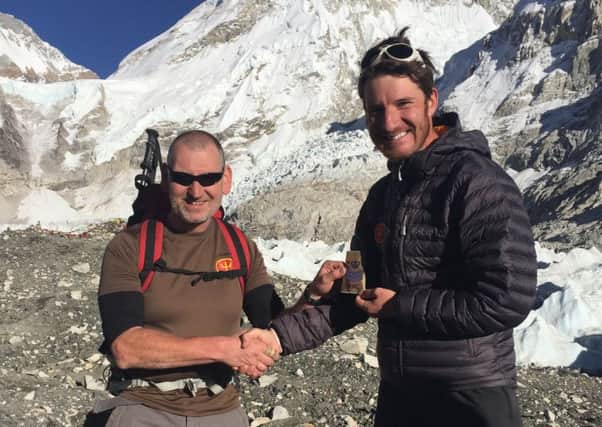 Army Reservist Sergeant Kelvin Davies from Crawley is the first soldier ever to be promoted while on an expedition to Everest Base Camp - picture submitted by The British Army