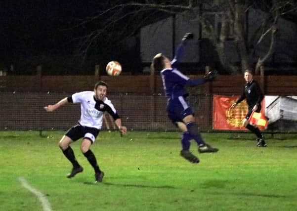 Action from Pagham's 6-0 win over Loxwood / Picture by Roger Smith