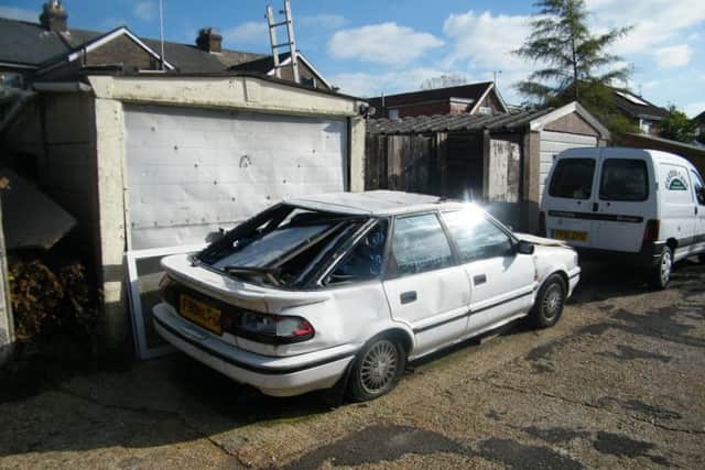 A Hailsham couple have been fined after setting up a scrapyard outside their home.