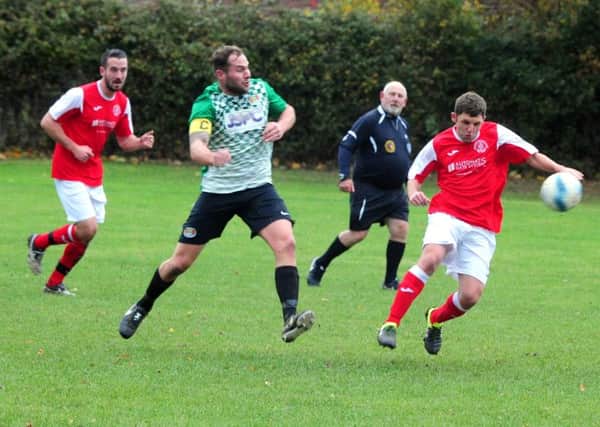 Bosham are flying in the cup and league / Picture by Kate Shemilt