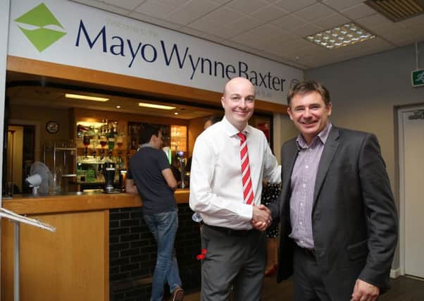 Commercial Manager Graham Wright and Simon Keeler, of Mayo Wynne Baxter's Gatwick office. Image by : James Boardman

The Mayo Wynne Baxter Exuctive Suite at the Checkatrade Stadium in Crawley. July 16, 2016.
James Boardman / Telephoto Images
+44 7967 642437 SUS-161213-140408002