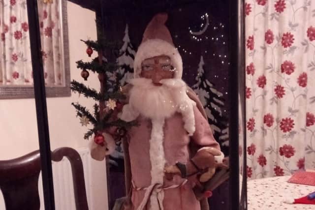 A vintage Santa Claus Wilf has collected from around 1900 to 1910