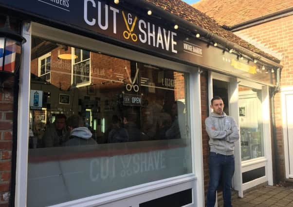 Phil Trow outside Cut and Shave Vintage Barbers