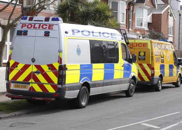 Police outside a house in Aldwick Road, Bognor, in April last year. Picture by Eddie Mitchell
