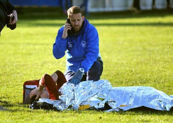 Selsey FC v Storrington FC 02-01-16. Storrington player sustains a suspected double fracture. Pic Steve Robards  SR1637633