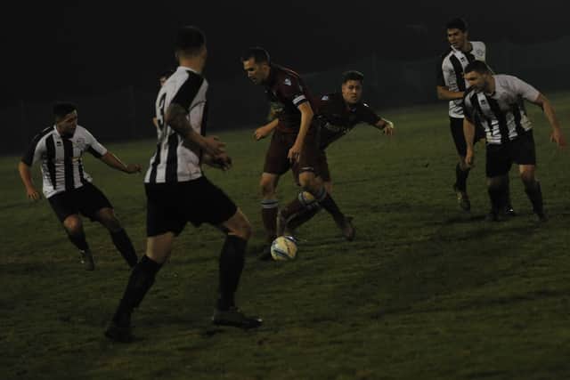 Two-goal Lewis Hole in possession. Picture by Simon Newstead
