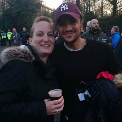 Crawley Town fan Lisa Vella with Peter Andre at Saturday's game against Newport County SUS-161219-105635002