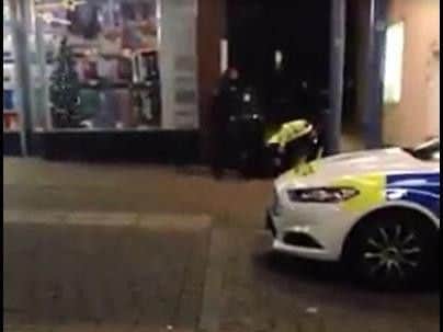 Police have launched an investigation after an officer was filmed hitting a member of the public from Eastbourne that he was trying to arrest in Newhaven.