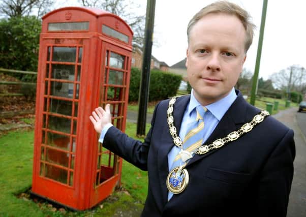 Horsham council chairman Christian Mitchell who is backing a campaign to save red phone boxes. Pic Steve Robards  SR1636836 SUS-161219-114612001