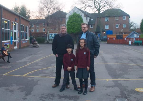 Mr Lawrence Laughlin, head teacher at Swiss Gardens Primary, Max, 6, Mia 9 with father Alastair Reid, FAST campaigner