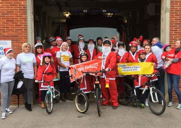 Alex Mould and the Santa Cycle team