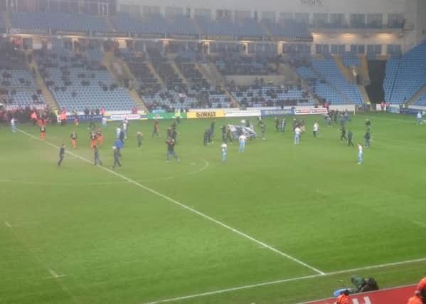 Coventry fans invade the pitch during last weeks match with Sheffield United