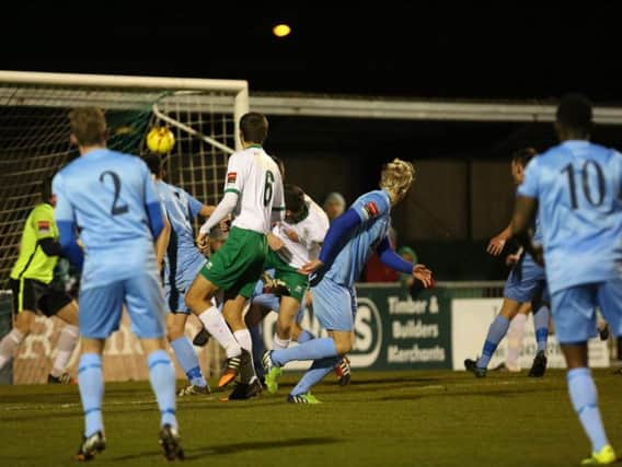 Ed Sanders (No6) glances in the Rocks' first-half goal / Picture by Tim Hale