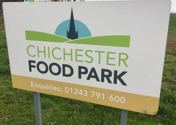The man died after becoming trapped in machinery at a composting site in Chichester Food Park