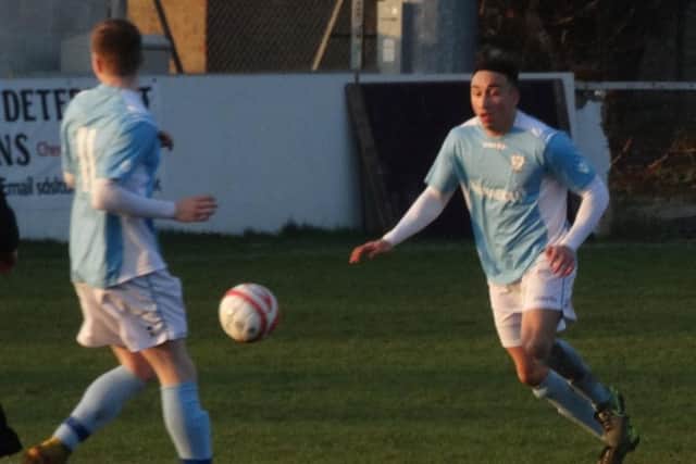Ashley Kidman attacks the ball for Bexhill United against Southwick. Picture courtesy Mark Killy
