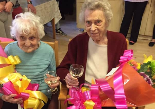 Centenarians Ethel Gaish and Ruby Horner were both presented with flowers