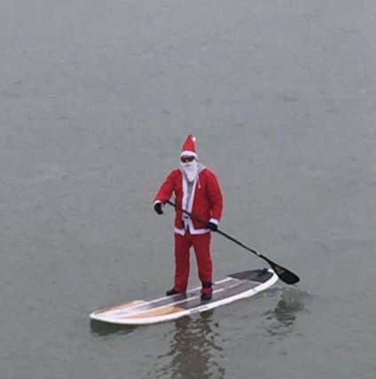 One of the paddling Santas