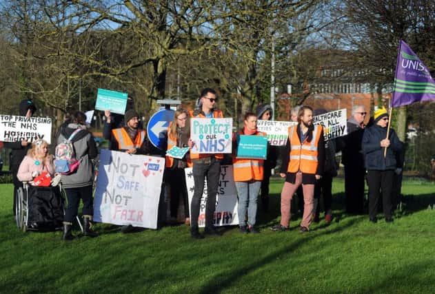Demonstrators outside the Conquest Hospital in Hastings on the day of the junior doctors' strike. SUS-161201-111903001