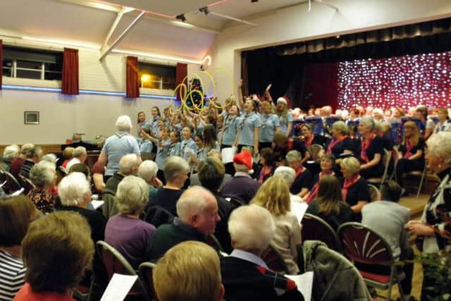 The audience was treated to harmonious singing from both the Sussex West County Guide Choir and the Friendship Singers