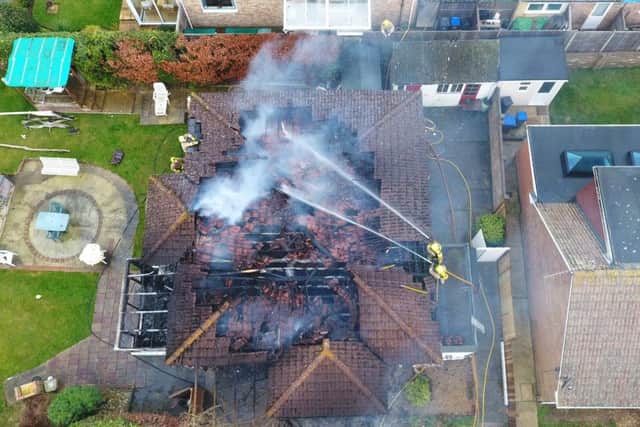 Firefighters at the bungalow in Durrington Hill. Picture: Eddie Mitchell