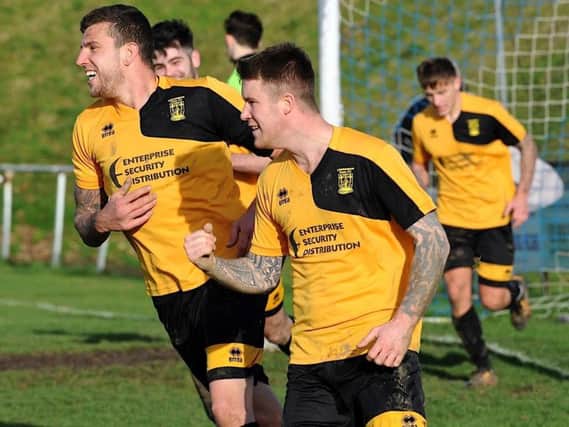 George Gaskin celebrates one of his three goals for Littlehampton at Worthing United today. Picture by Stephen Goodger