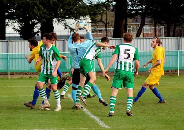 Chichester City in action against Pagham - and they followed their derby draw with a win at Arundel / Picture by Roger Smith