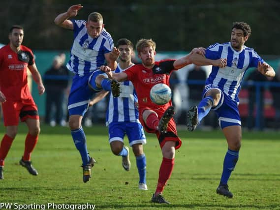 Action from Haywards Heath Town v Hassocks.