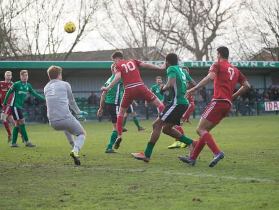 Worthing's Ross Edwards heads home. Picture by Marcus Hoare.