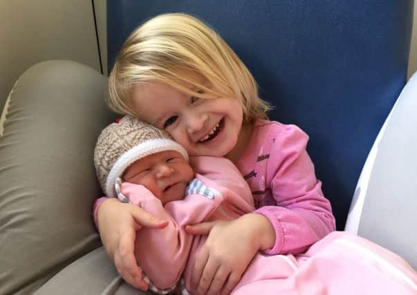 Baby Georgia with sister Phoebe