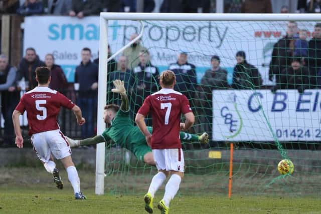 Lewes goalkeeper Chris Winterton is beaten by Frannie Collin's free kick for Hastings United's second goal on Boxing Day. Picture courtesy Scott White