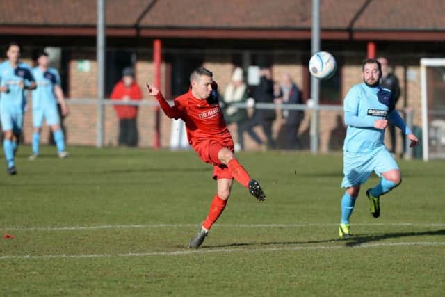 James Westlake in action against AFC Uckfield. Picture by PW Sporting Photography