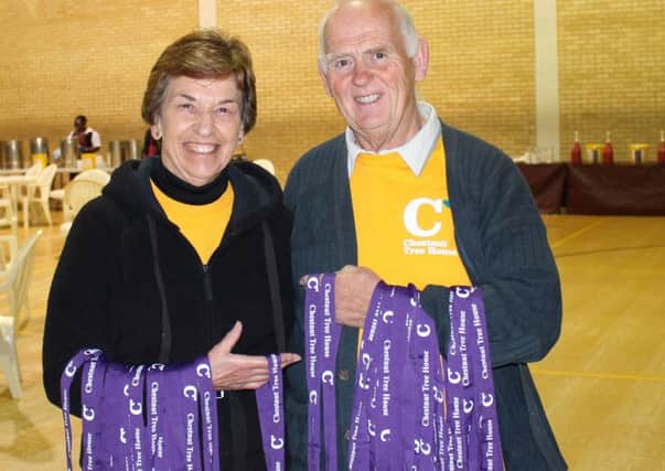Volunteer Gill Chapple, 69 from Eastbourne, with fellow volunteer Alan