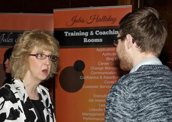 Secret Millionaire Gill Fielding chats to a small business owner at the Better Business show. Pic supplied by Worthing and Adur Chamber of Commerce SUS-160202-141411001