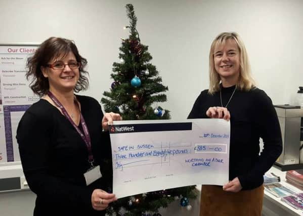 Tracie Davey, operations manager at Worthing and Adur Chamber of Commerce, left, presents the cheque to Louise Gisbey, fundraising and marketing manager for Safe in Sussex wbNoMd1IMAvnAt8AQ0ez