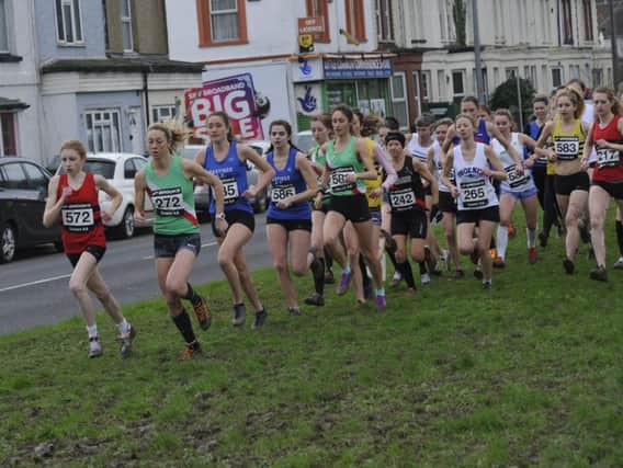 Competitors tackle somewhat heavier conditions in last year's Sussex Cross-Country Championships at Bexhill Down. Picture by Simon Newstead