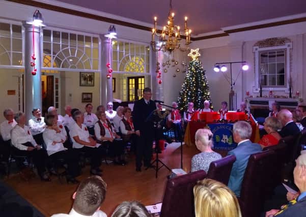 Guests joined in with rousing carols sung by the Ham Manor Singers